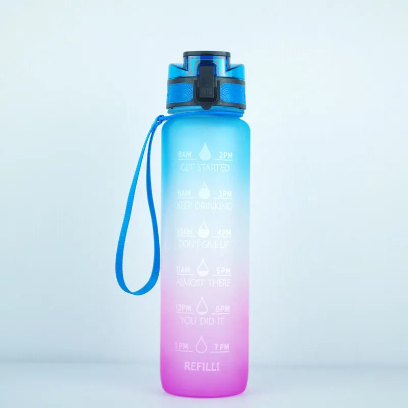 Transparent 1000ml BPA-free Tritan sports bottle with infuser and clear liquid visible
