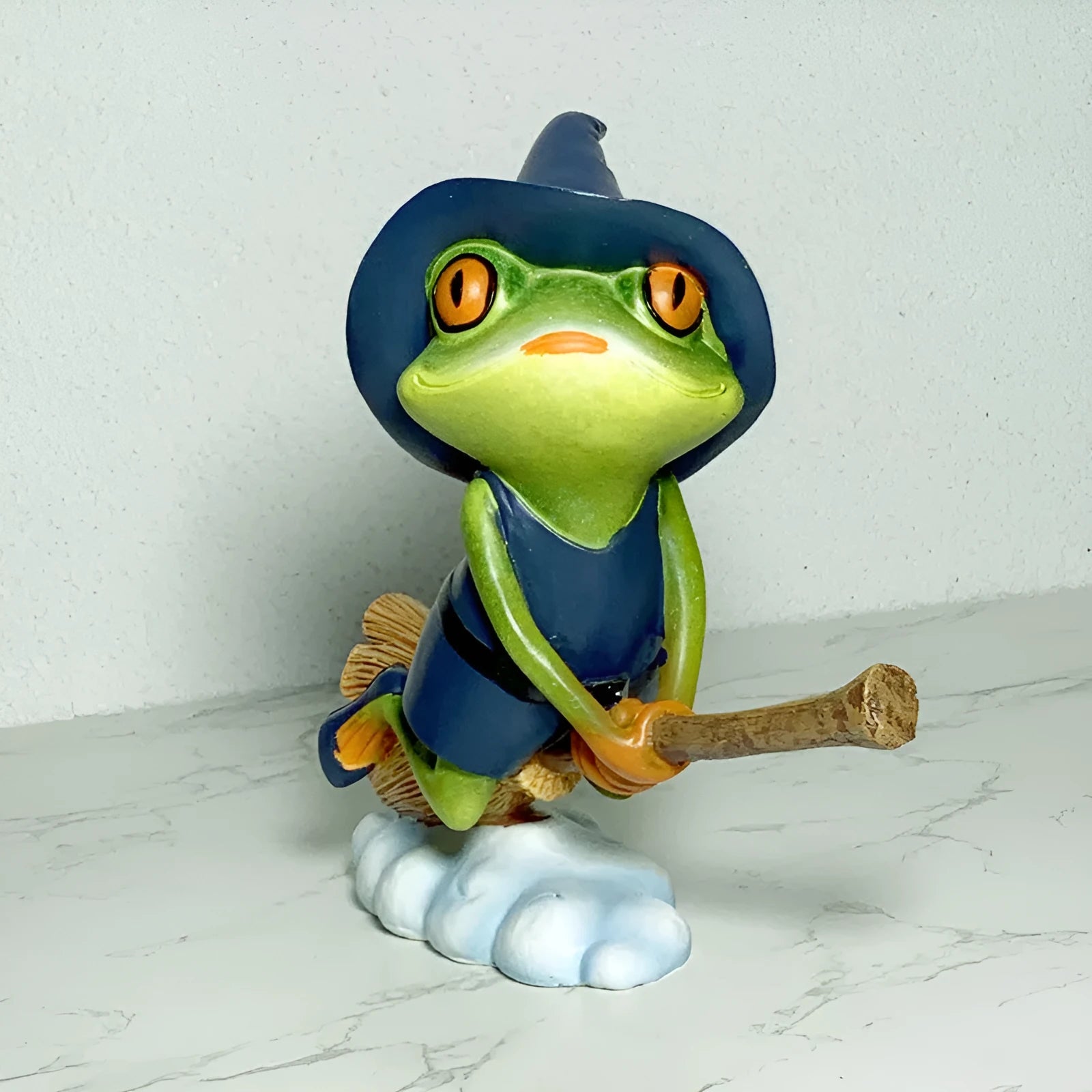 Magic yoga frog figurine in RDW123 colour on a tabletop.