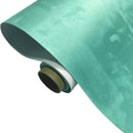 Rolls and sheets of coloured self-adhesive suede leather material for DIY projects.