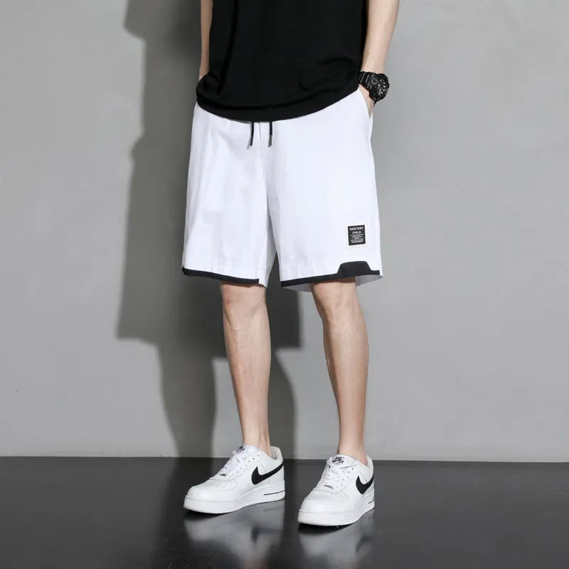 Boys' cotton shorts in black, shown in a casual style for summer home and sports wear.