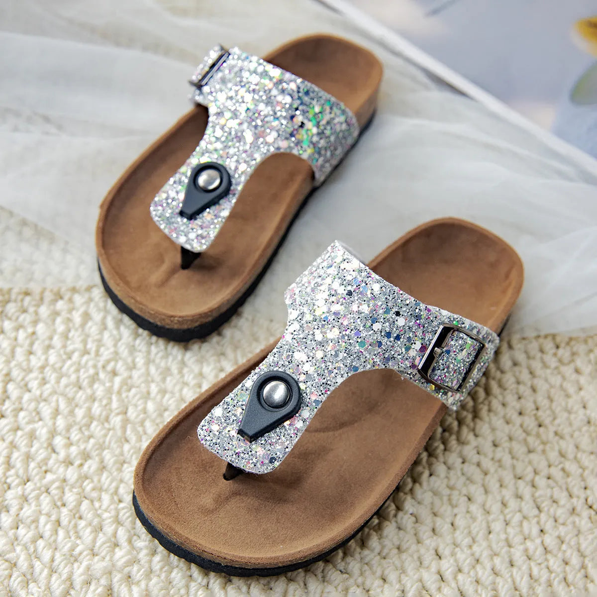 Cork flip-flops with frosted artificial leather upper and PVC sole in pink, silver, or gold colours