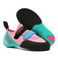 A pair of black and red rock climbing shoes with Velcro straps and a rubber sole.