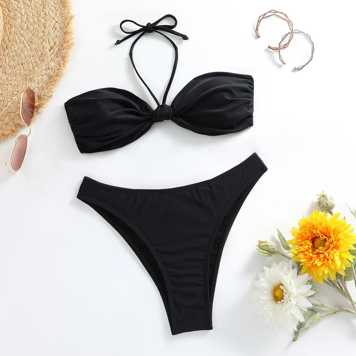 Black women's bikini set with lace-up tube top and matching swim briefs