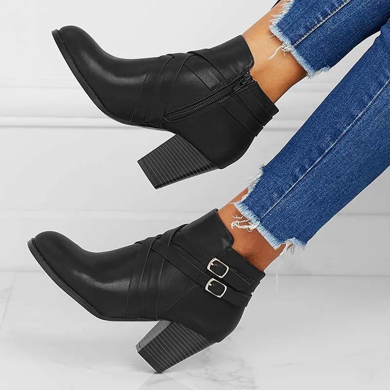 Grey plus size women's ankle boots with 7cm heel, side zip and belt buckle.