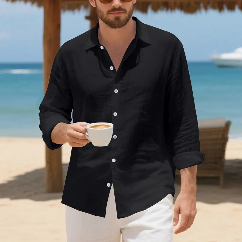 Men's loose fit linen Hawaiian casual shirt on a hanger, shown in light blue colour.