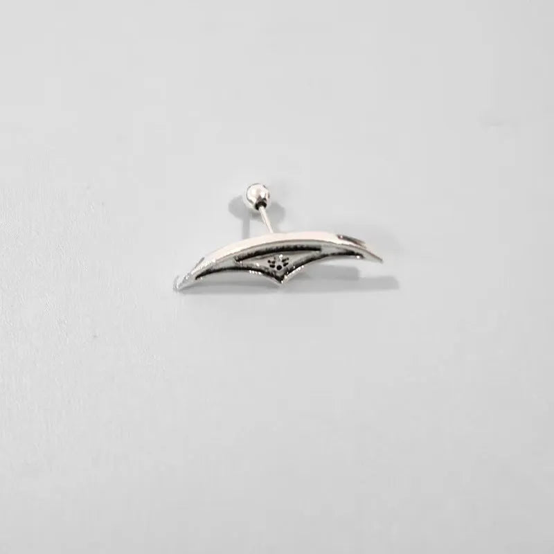 Spider web design stud earrings in gold and silver metal with geometric mesh pattern