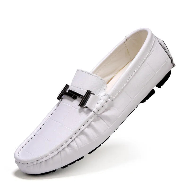 Men's leather casual shoes with buckle detail in four colour options showing flat heel and rubber sole