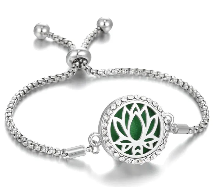 Hollow stainless steel adjustable aromatherapy bracelet with 20mm box diameter and electroplated alloy finish on white background