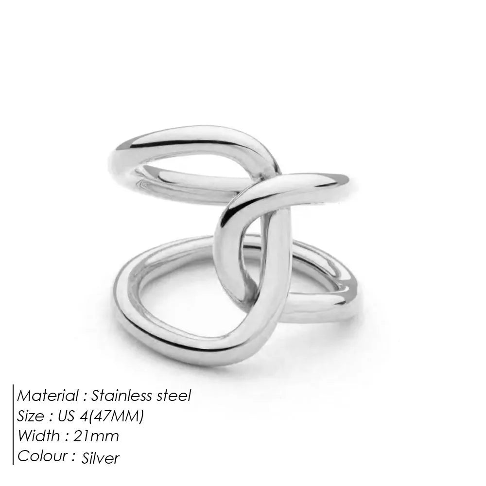 Adjustable stainless steel ring with knotted geometric design in gold or steel colour on finger