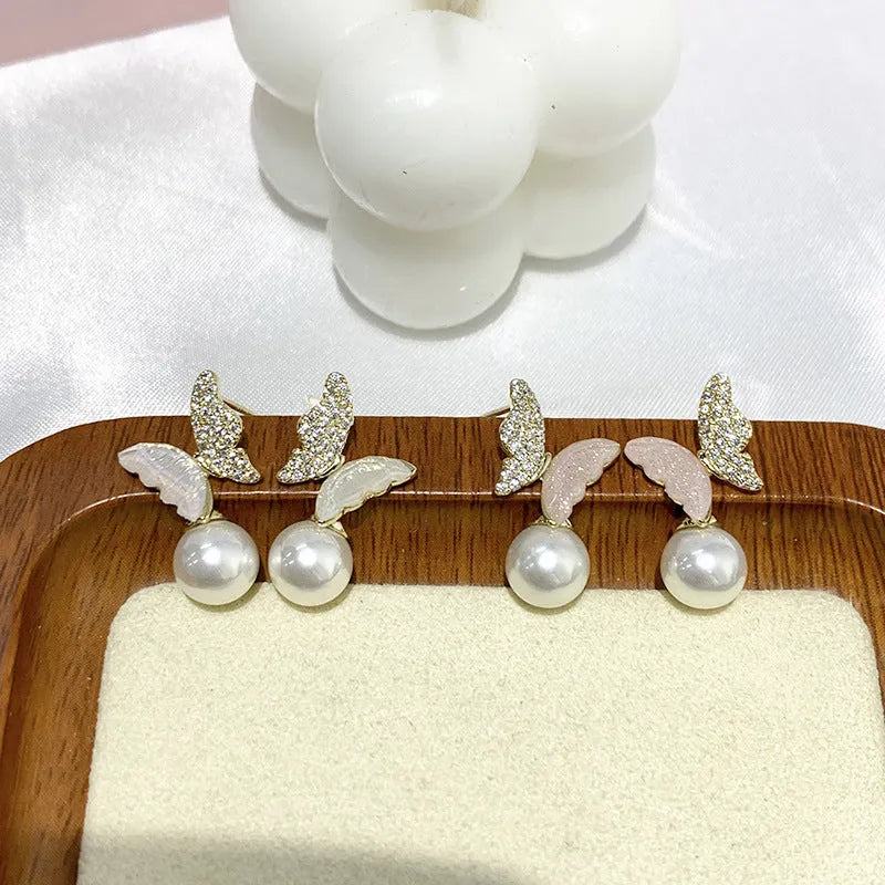 Pearl Zircon Bow Temperament Light Luxury Niche Earrings in pink colour, dangle style