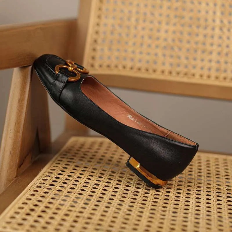 Women's Wanwan Lei style black low heel pumps with square toe and high heel over 8cm on rubber sole.