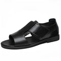 Men's black and brown leather Roman sandals with open-toe design and rubber soles
