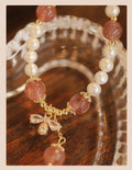 Strawberry quartz crystal bracelet with stringed pearls and bow charm in INS style