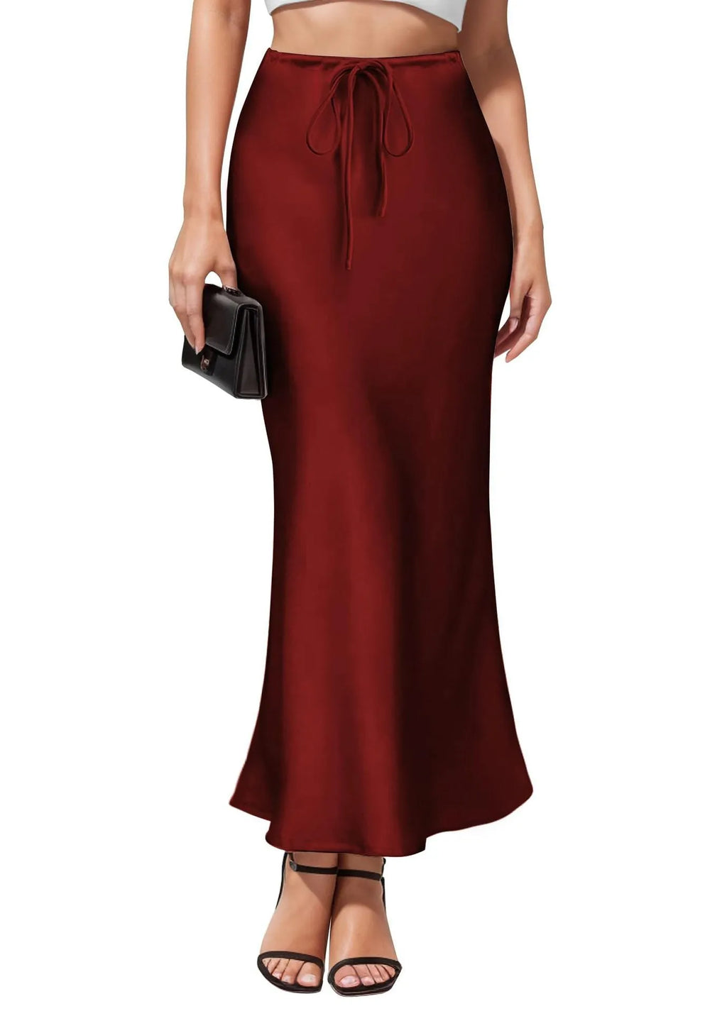 Women's asymmetric acetate satin skirt in a solid colour with high waist and irregular stitching detail.