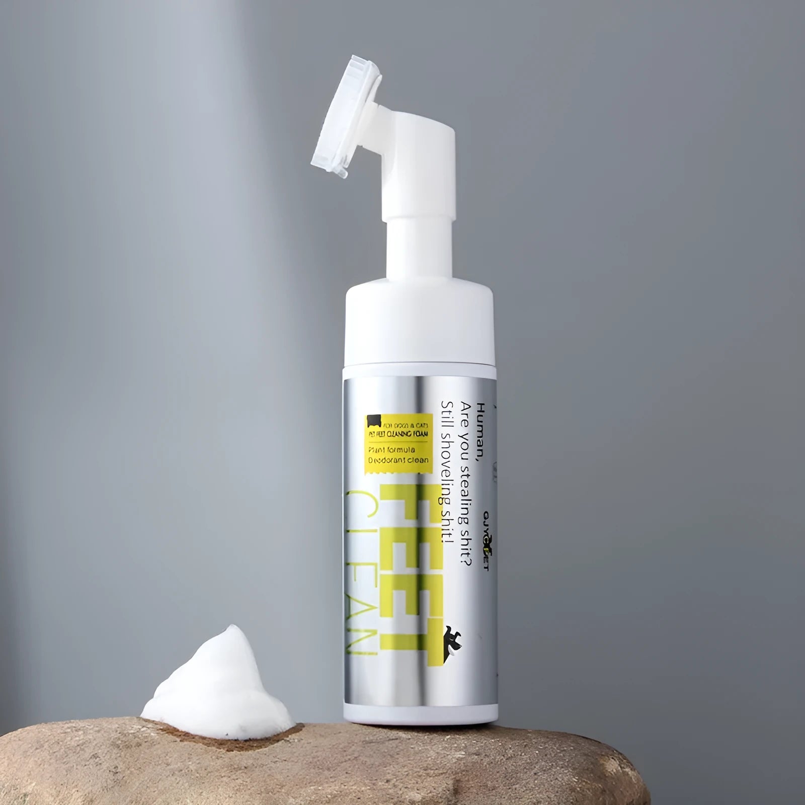 Pet grooming kit with bottles of no-rinse paw wash foam, ear cleaner, deodorant spray, and packs of pet ear and eye wipes.