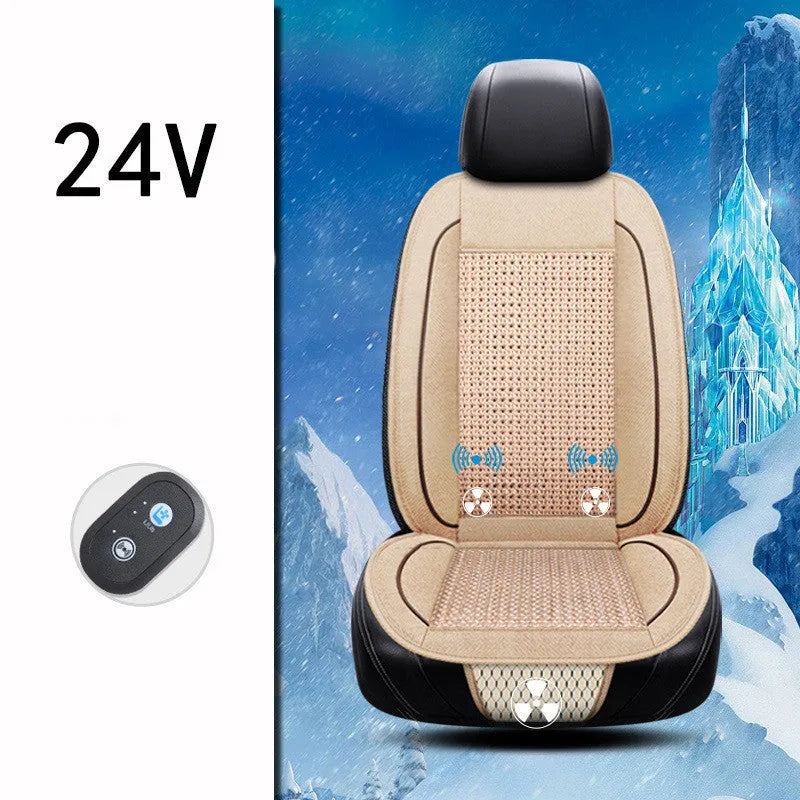 Square black car ventilation seat cushion on a car seat with a connected power cord.