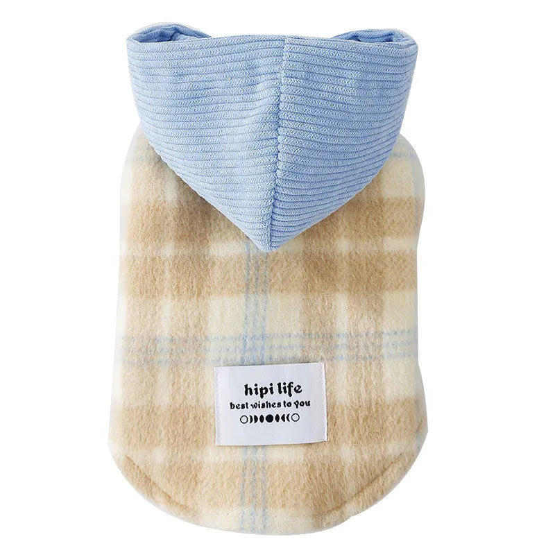 Blue corduroy dog hooded vest with a chessboard grid pattern and traction detailing.