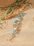 Alloy rhinestone marine bracelet with boat anchor and shell details in blue coral colour