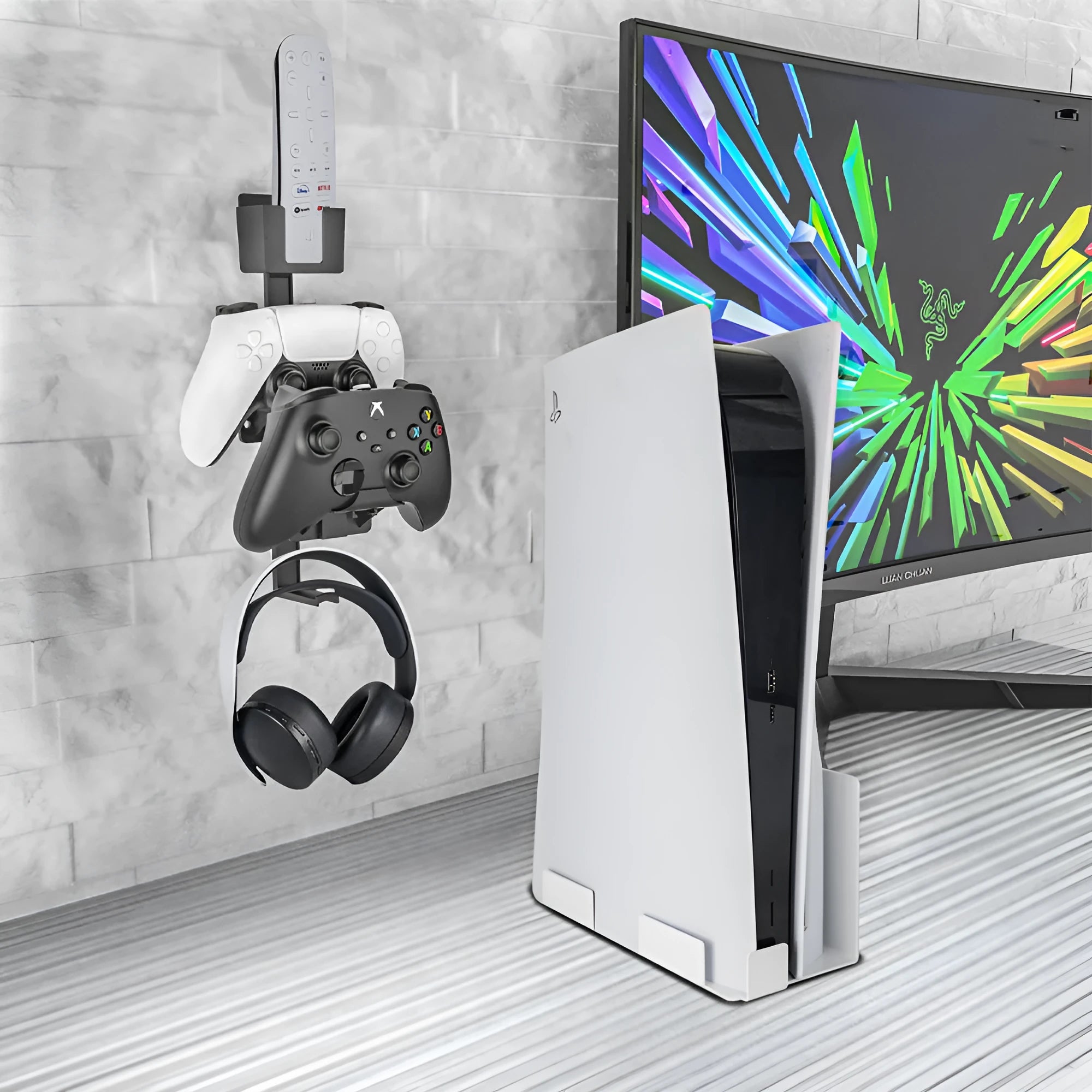 White ABS plastic wall hook holding a PS5 controller and gaming headset.