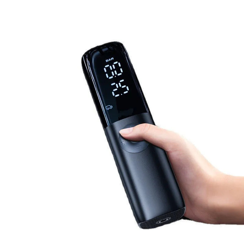 Black portable electric vehicle air pump with tyre pressure gauge and inflation tube