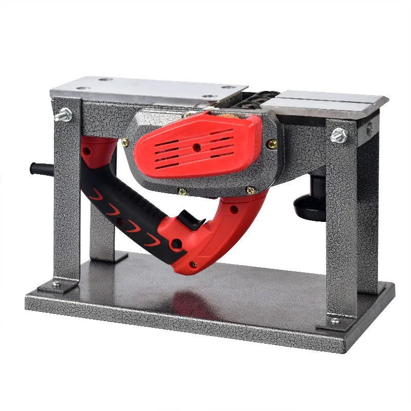 Red desktop electric wood planer with aluminium shell showing 82mm cutting width