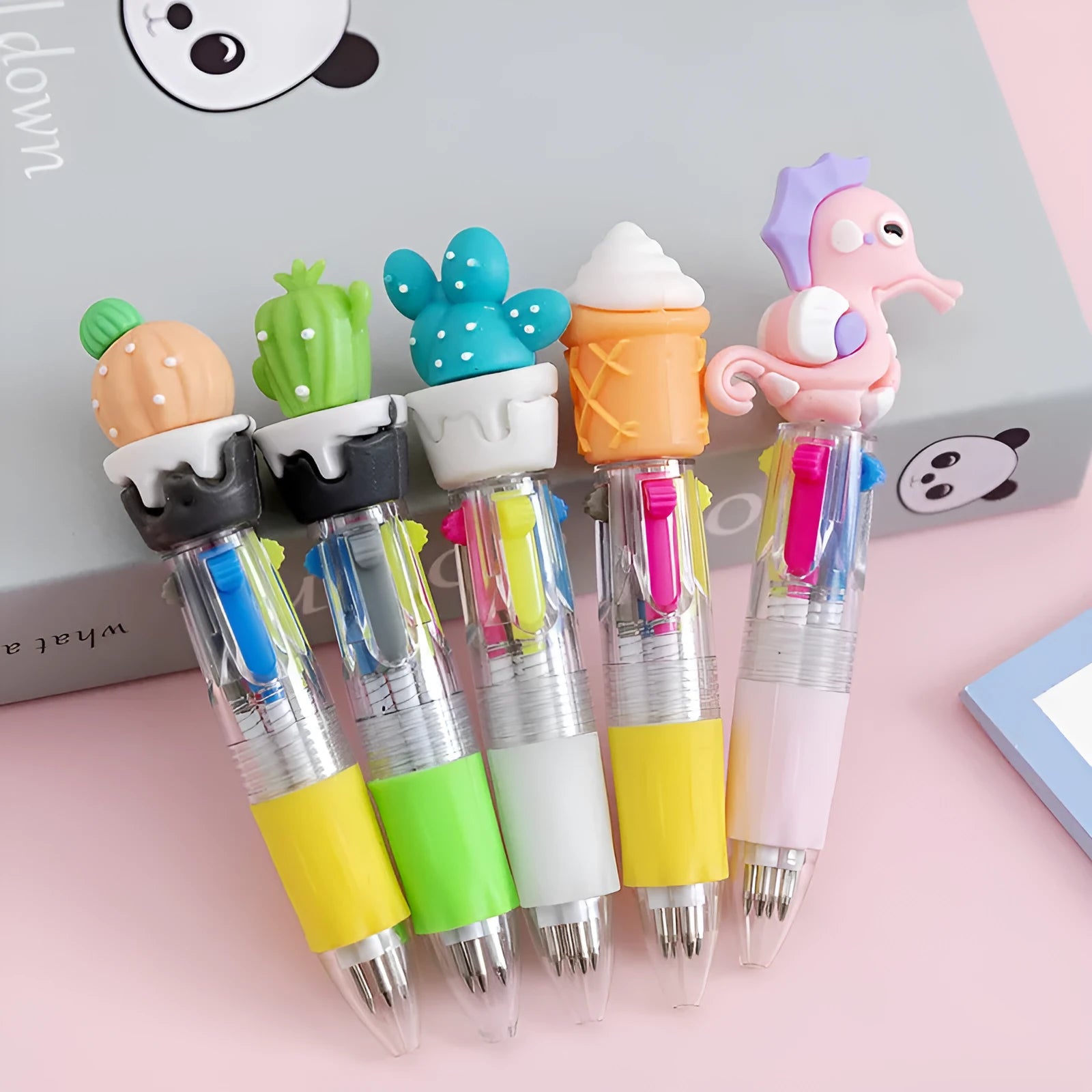 Cartoon-themed four-colour press ballpoint pen with 0.7mm bullet tip