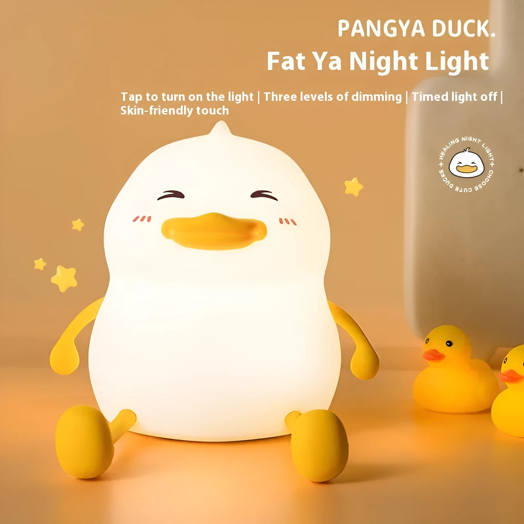 Chubby creative night lamp with phone holder function in silicone and plastic construction