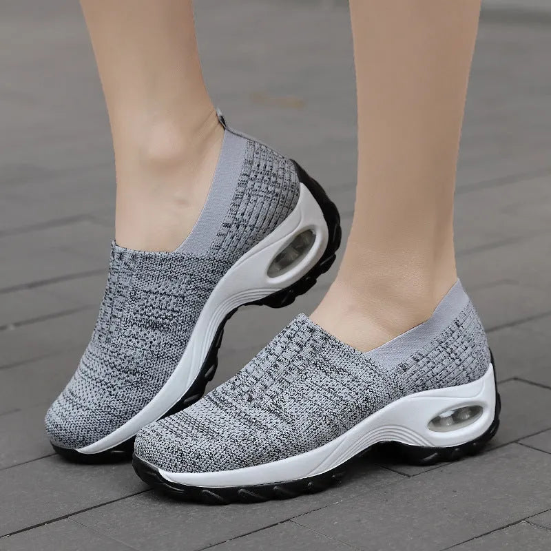 Breathable mesh slip-on sports shoes for women with air cushion sole, round toe, thick bottom, available in light gray