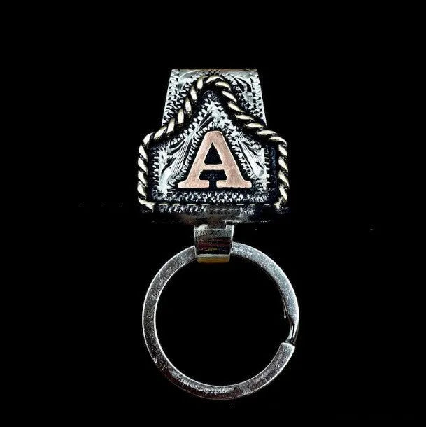 Handmade metal cow tag belt keychain in a selected colour from the A-Z letter range.