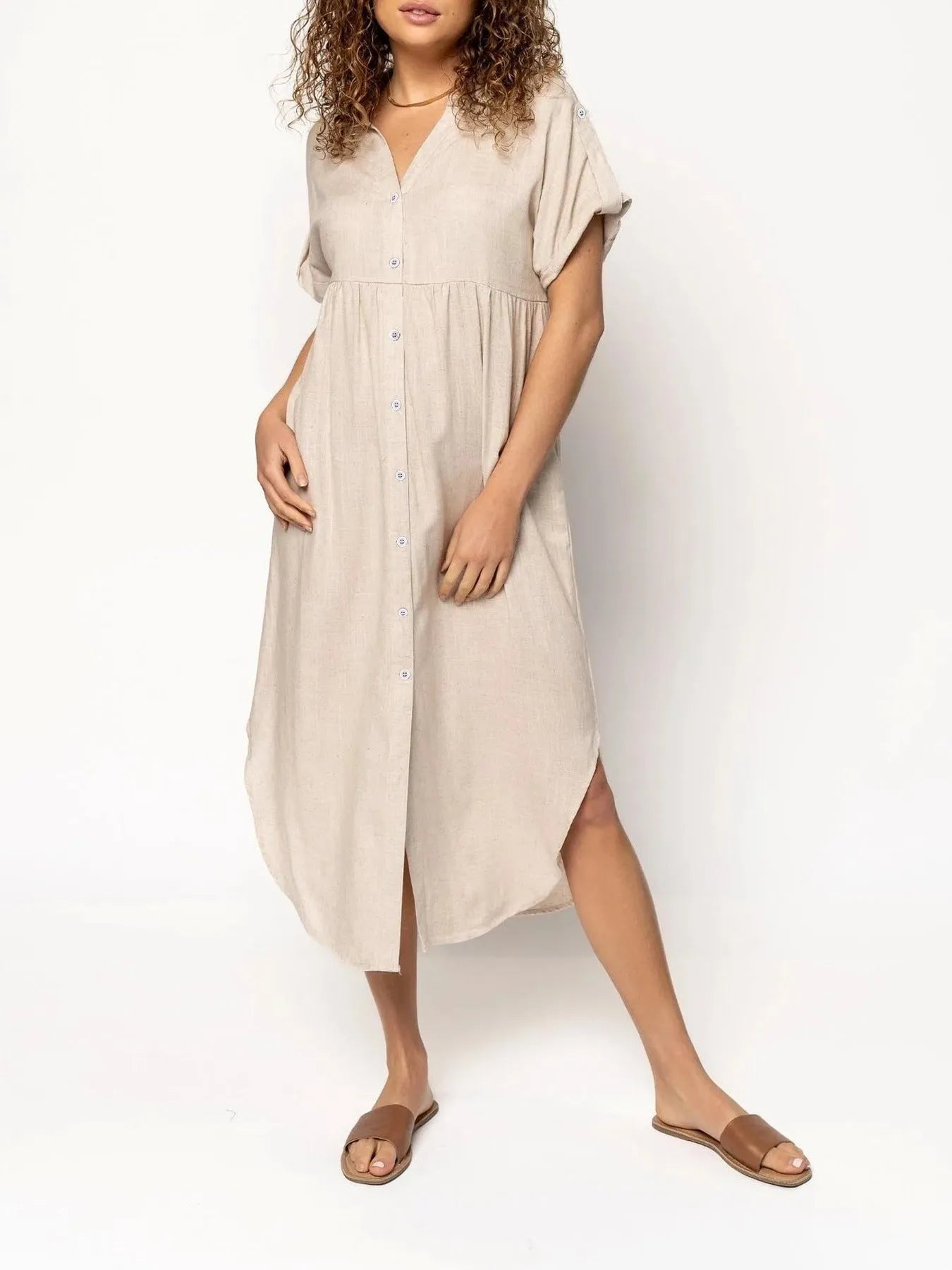 Loose temperament mid-length casual dress with button detailing in polyester fabric