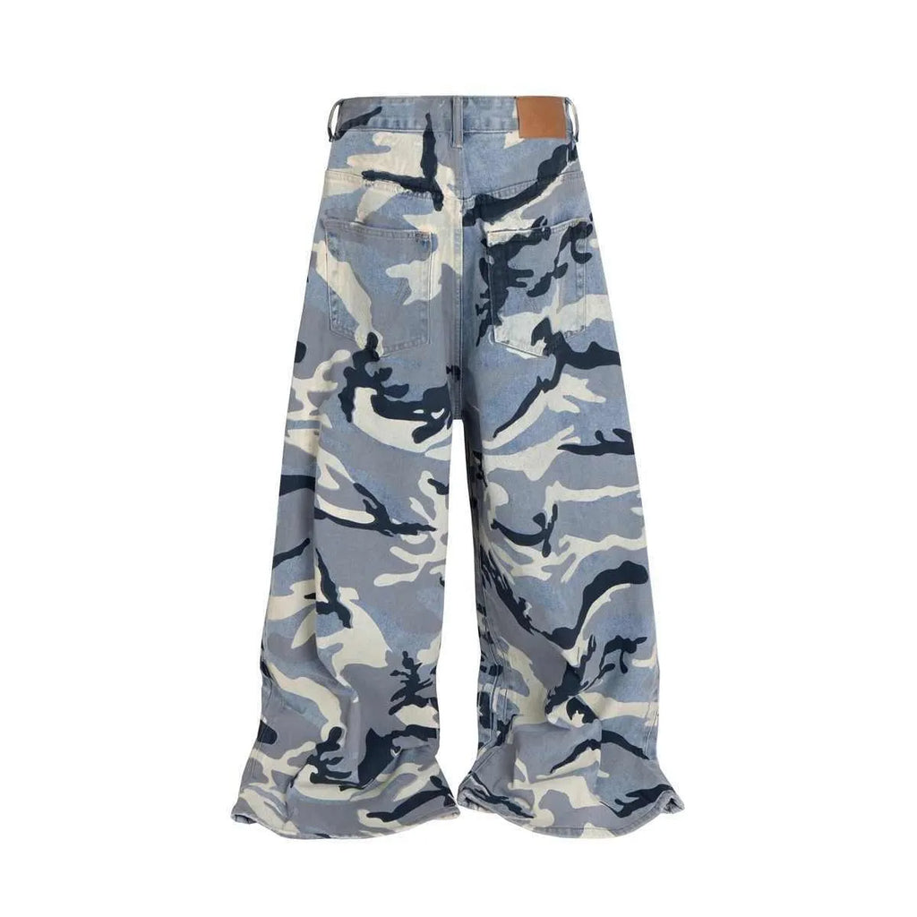 Snow camouflage blue loose-fit denim jeans laid flat, showing mid waist and trouser cut.