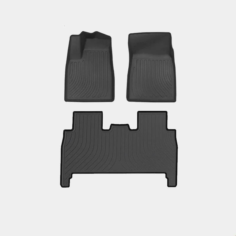 Tesla Model X waterproof TPE rubber floor mats showing left and right rudder design for vehicle-specific fitment