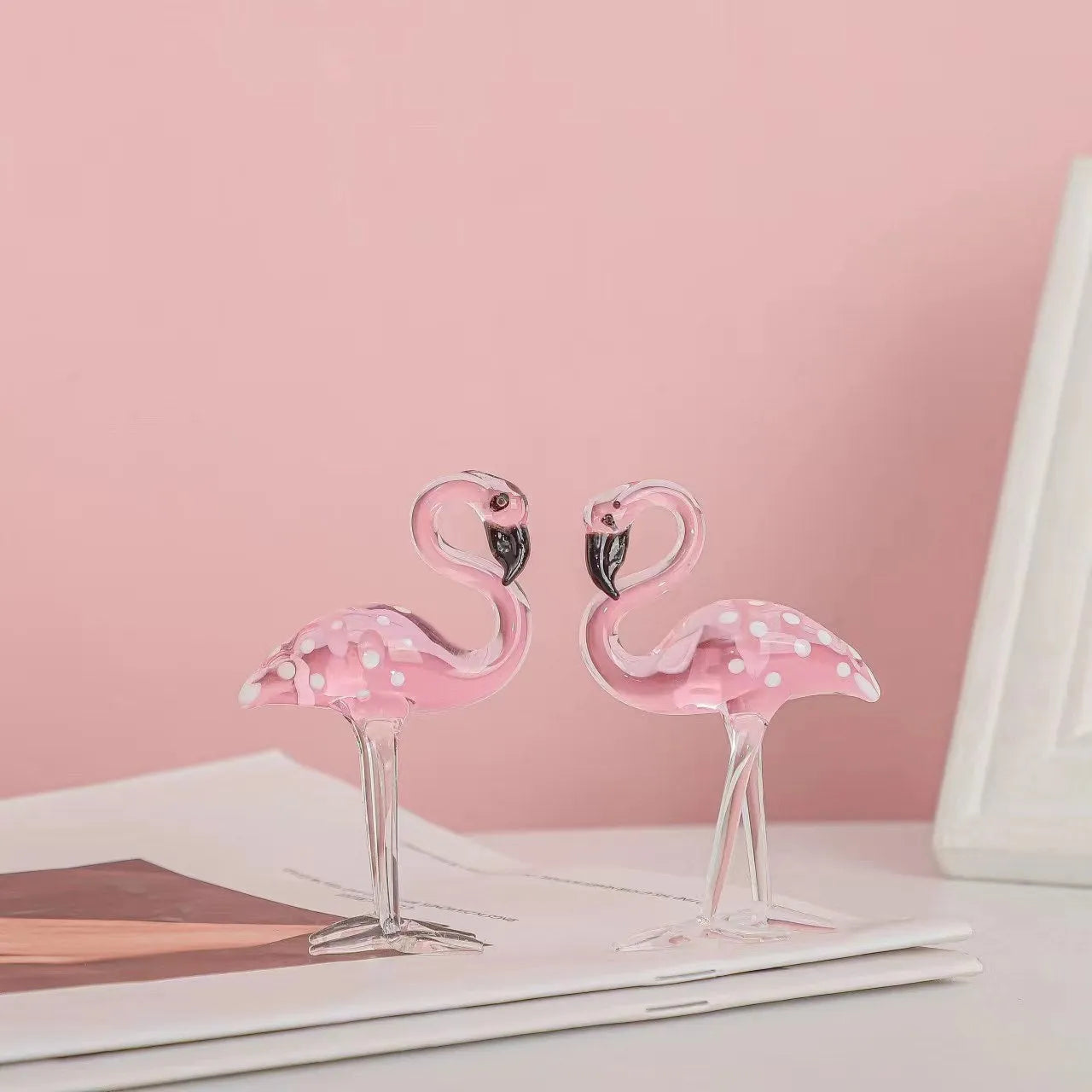 Pink crystal flamingo decorative figurine on table with modern simple style
