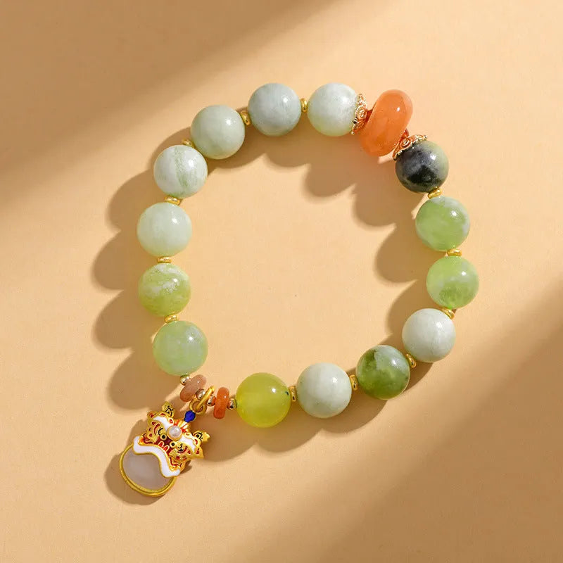 Green milk-in-water Xingshi jade geometric pendant on an adjustable string bracelet