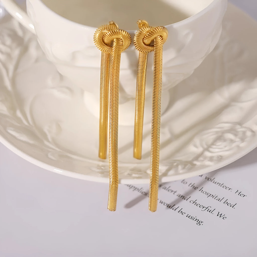 Gold knotted tassel necklace and matching earrings set with snake chain