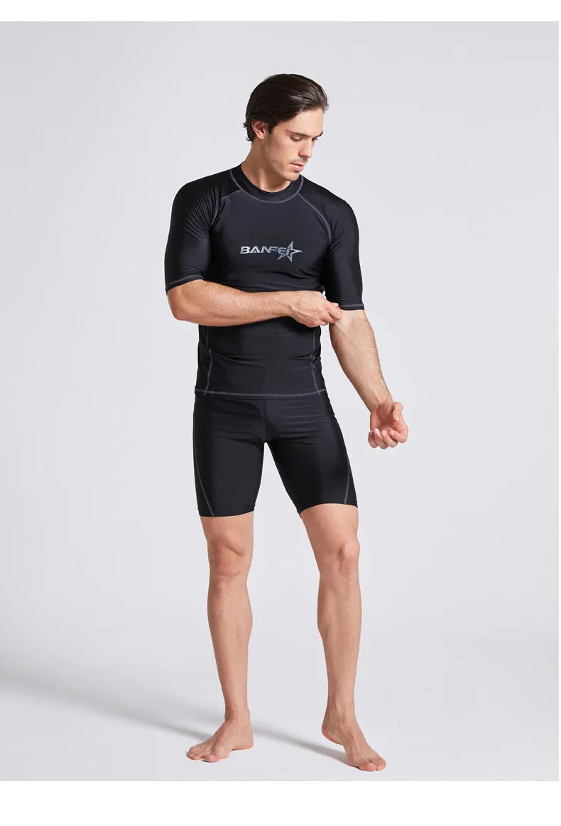 Men's half sleeve swimsuit wetsuit in nylon fabric for snorkelling and surfing activities