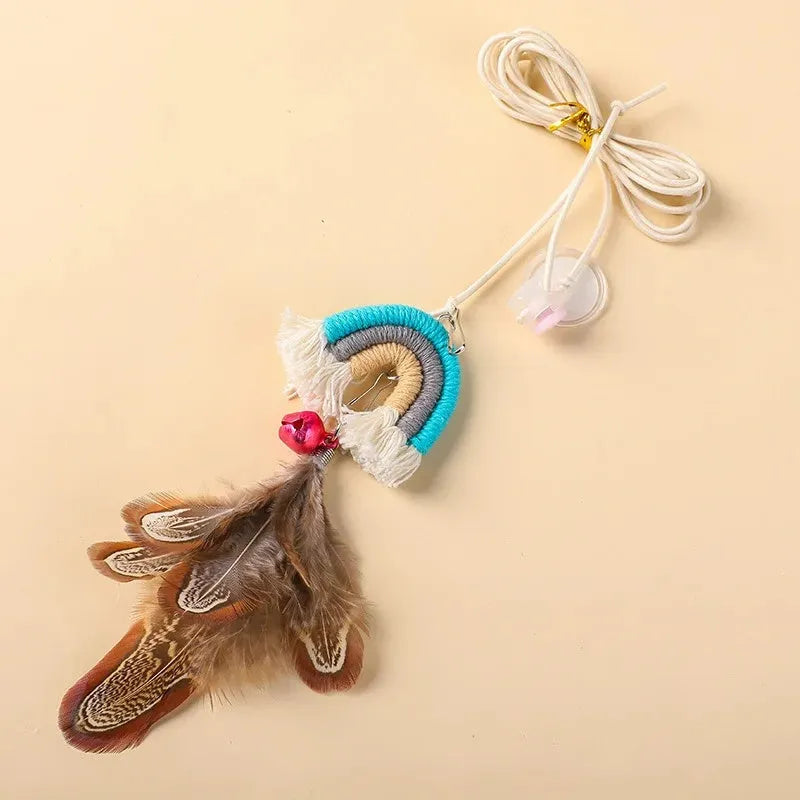 Blue feather rope cat toy hanging from door with elastic swing and sticky buckle clamp
