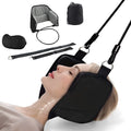 Black neck hammock cervical spine tensioner with velvet, sponge, and breathable mesh on a fitness bench