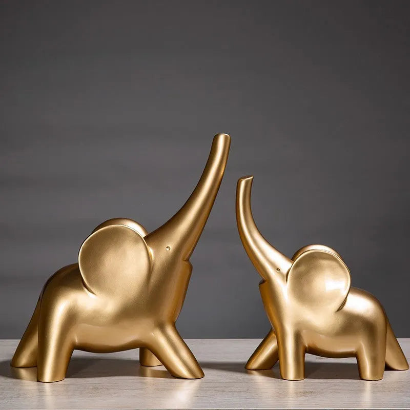 Modern resin elephant ornament in rose gold or white colour, available in large and small sizes.