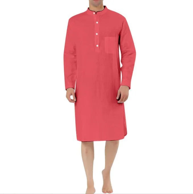 Man wearing a light blue cotton shirt-style robe with front pockets, showcasing casual loungewear.