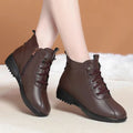 Women's casual shoes in black artificial PU with mid heel, side zipper, and round toe on light background