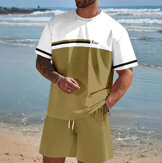 Man wearing a loose blue short-sleeved t-shirt and matching shorts from a summer leisure set.
