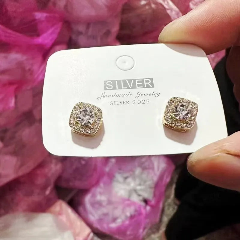 Geometric square diamond earrings in gold and silver alloy with quadrilateral design
