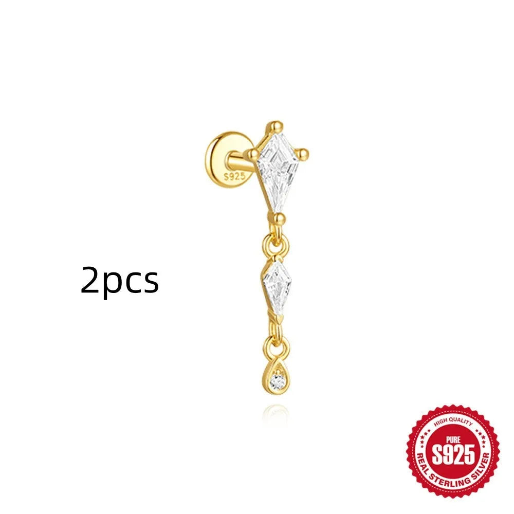 S925 sterling silver geometric kite earring with rhinestones and a chain tassel in a gold colour.