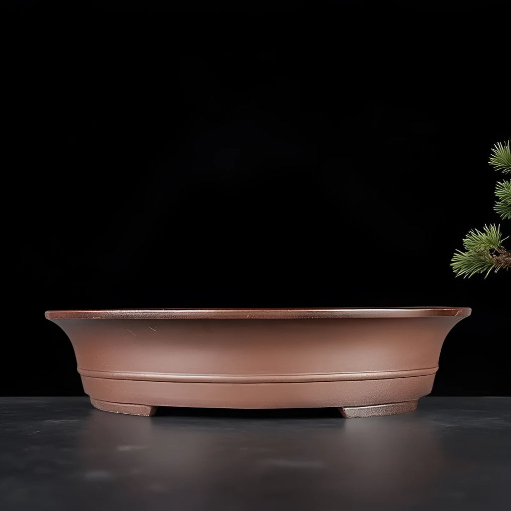 Handmade antique oval bonsai pot in Yixing purple mud, outer dimensions 66cm by 53cm, with a large planting area for pine and cypress