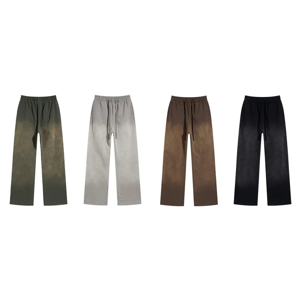 Men's loose cotton trousers in spray dyed colour, straight leg mid-rise cut for retro street style