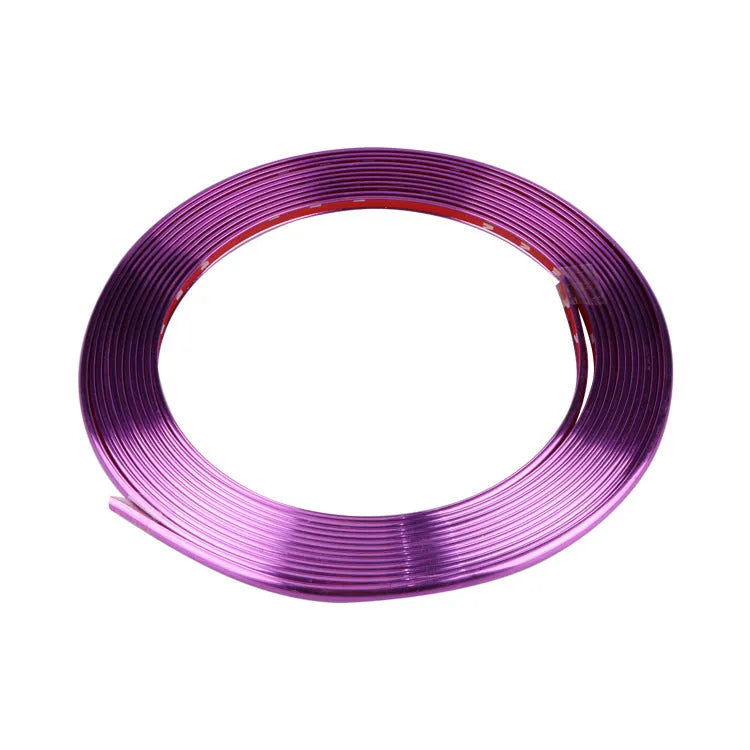 Roll of galvanised purple PVC wheel hub trim guard strip, 8 metres long.