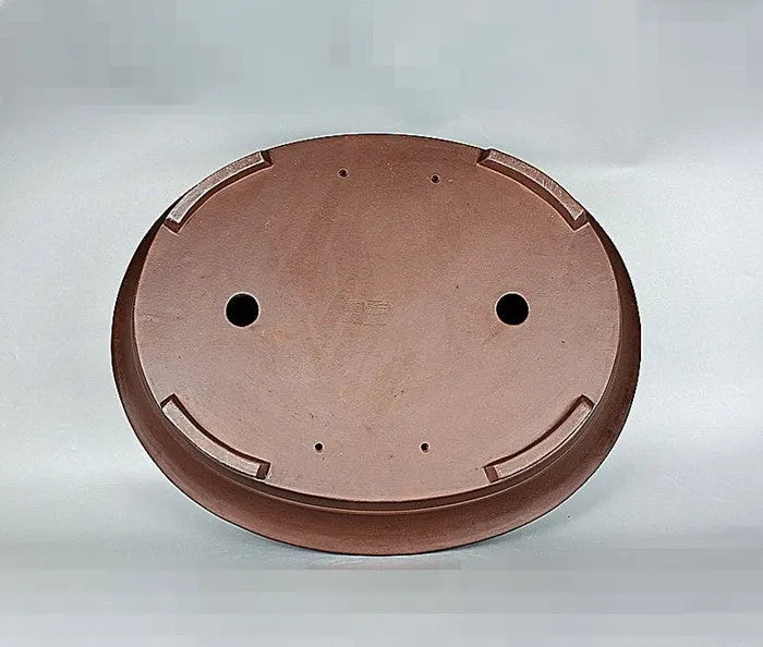 Handmade antique oval bonsai pot in Yixing purple mud, outer dimensions 66cm by 53cm, with a large planting area for pine and cypress