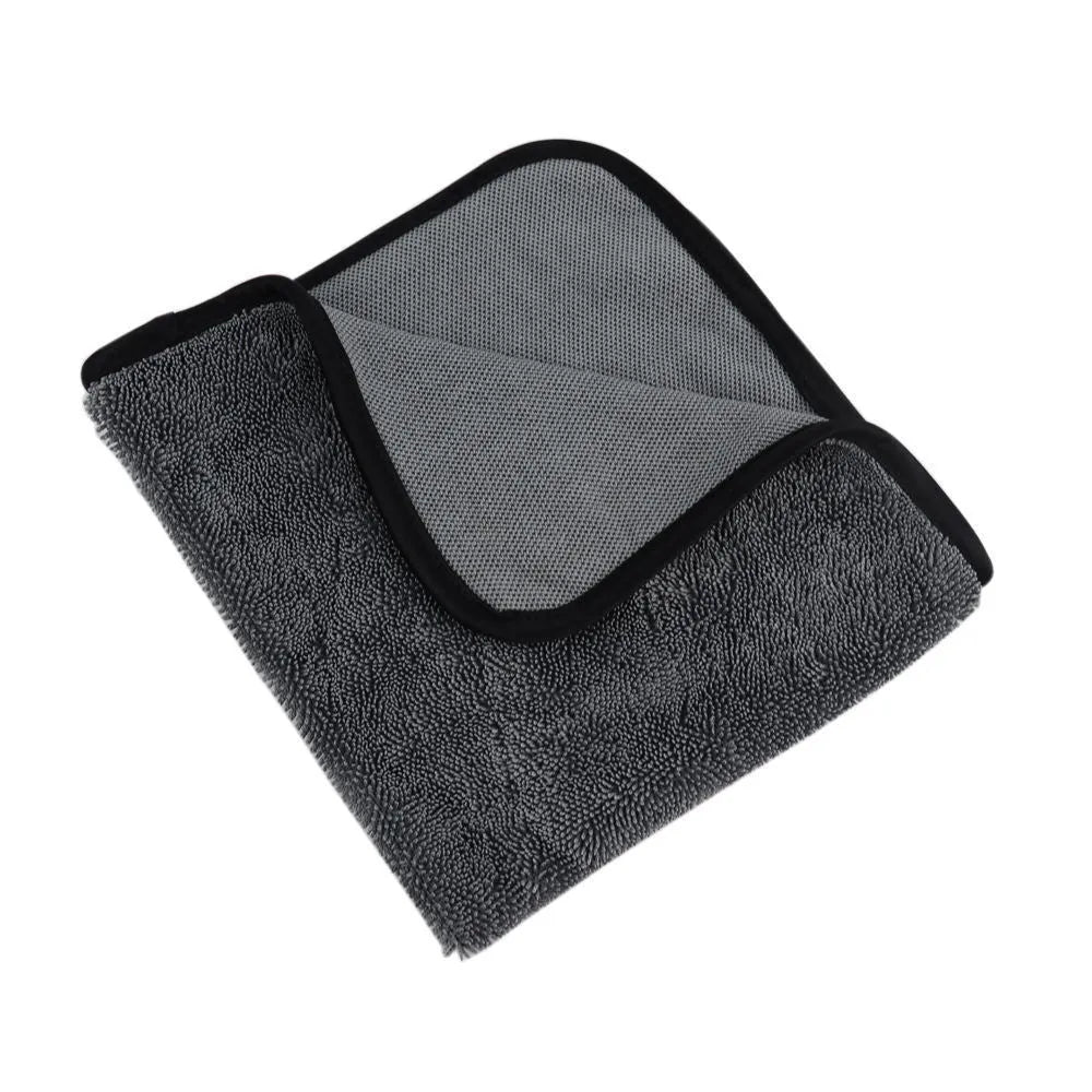 Grey square microfiber car wash towel for drying vehicles.