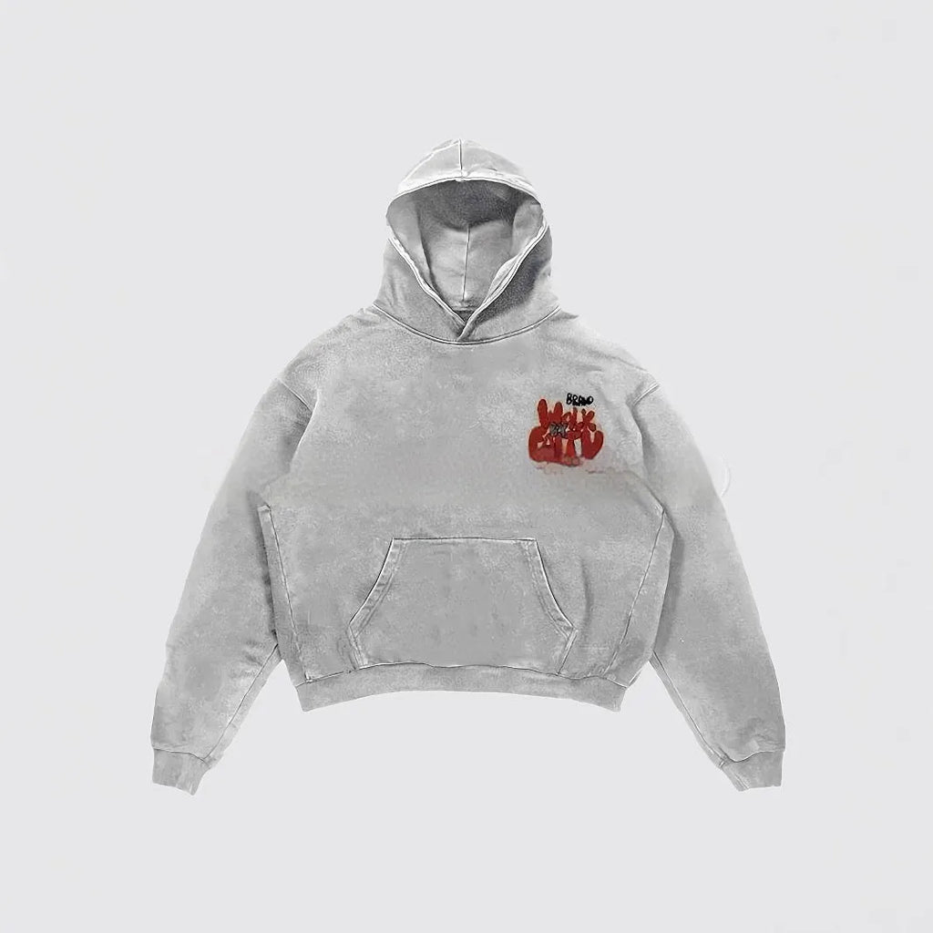 Women's grey hoodie with vintage character print, long sleeves, and side pockets.